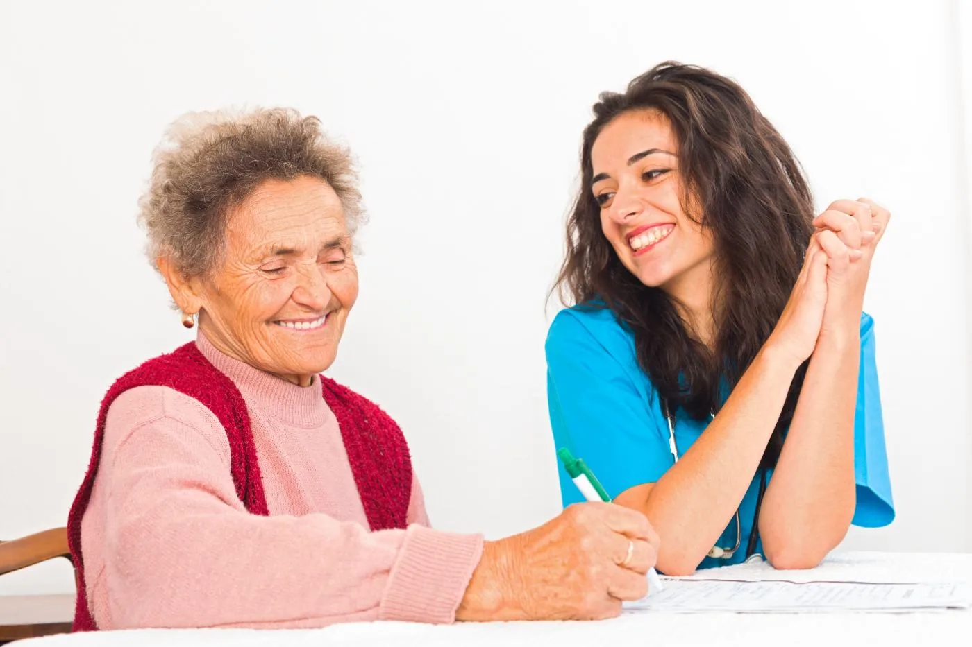 Mission Healthcare carer reviewing a personal care plan with a client in Dartford